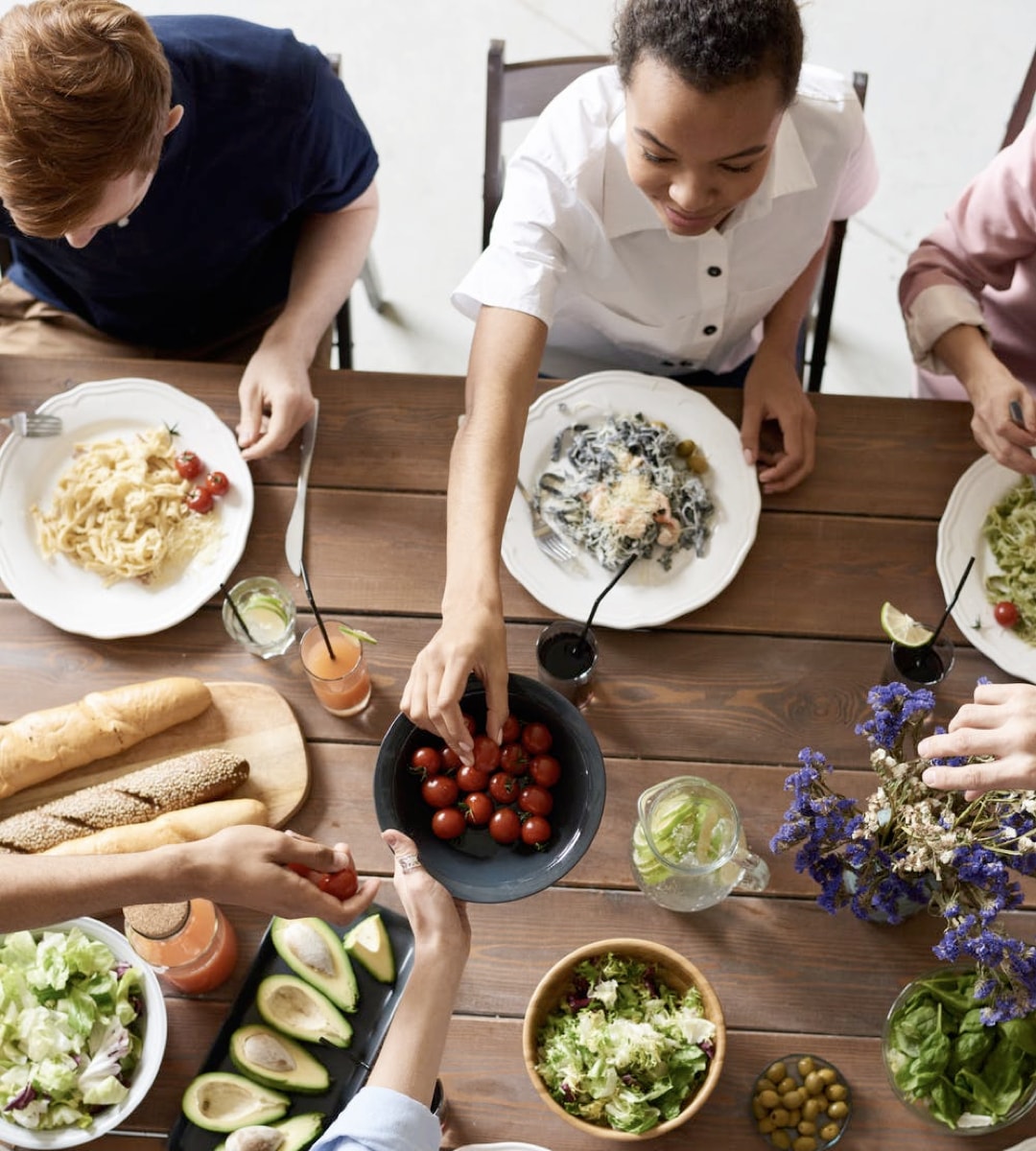 A family feasting at the dining table.