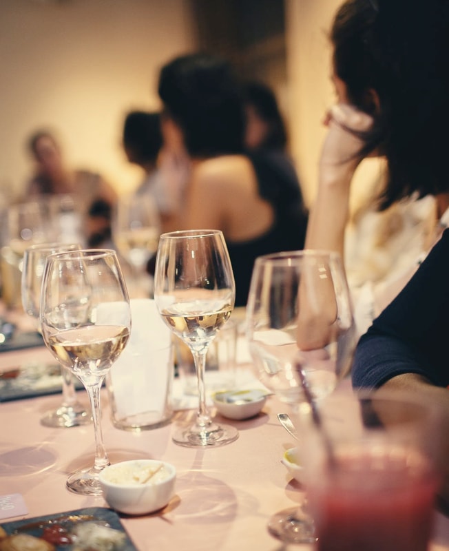 Customers enjoying a social dinner gathering.